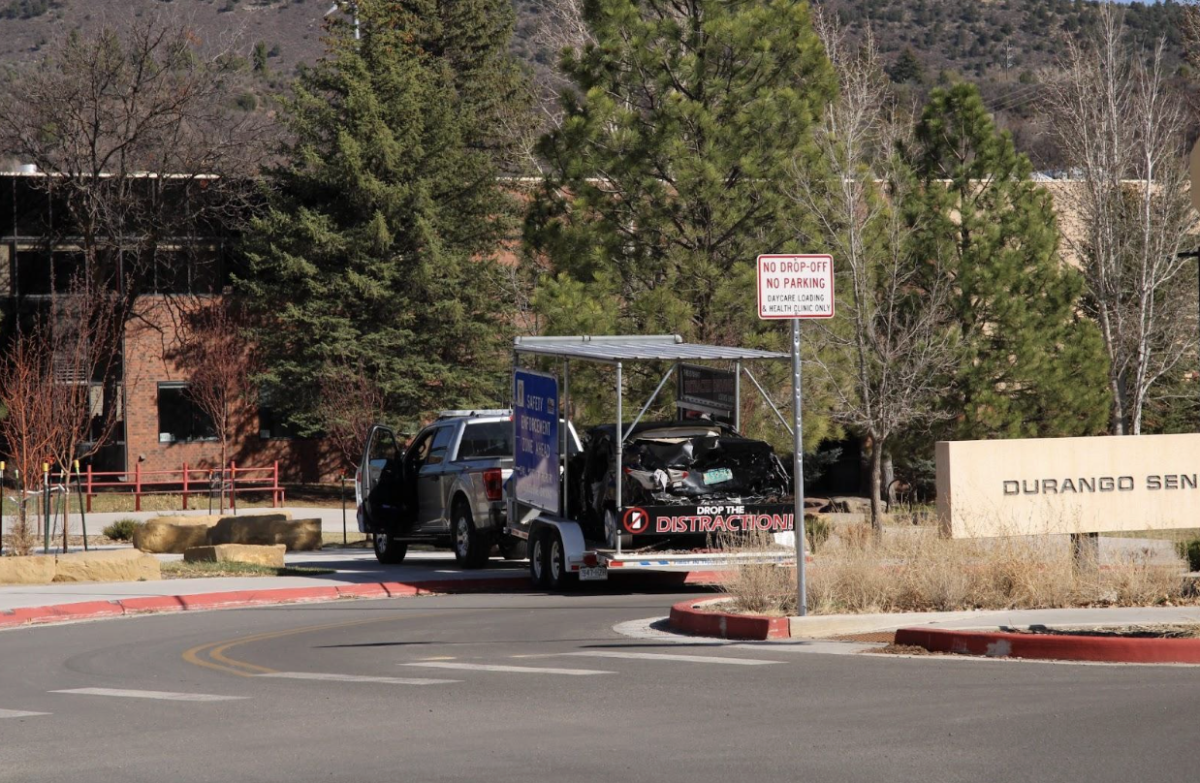 Car demonstration gets picked up in front of DHS on April 11 